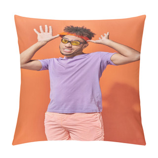 Personality  Young African American Man In Sunglasses Adjusting Headband On Orange Background, Expressive Face Pillow Covers