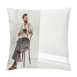 Personality  Handsome Bearded Man Sitting On Chair And Holding Vintage Film Camera Pillow Covers
