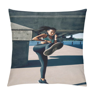 Personality  Young Sporty Woman Doing High Kick Outdoors. Young Female Athlete Demonstrates Kickbox. Stretching And Balance Concept                     Pillow Covers