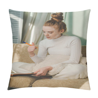 Personality  Thinking Woman Writing Ideas In Book, Doing Beauty Face Mask For Skincare Sitting In Living Room At Home. Cozy Time At Home. Self Time And Home Spa Concept Pillow Covers