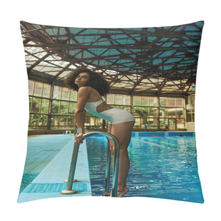 Personality  Young And Curly African American Woman In Bathing Suit Standing By Pool Ladder With Blue Water Pillow Covers