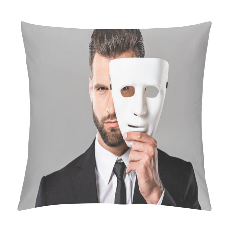 Personality  Serious Handsome Businessman In Black Suit Taking Off White Mask Isolated On Grey Pillow Covers