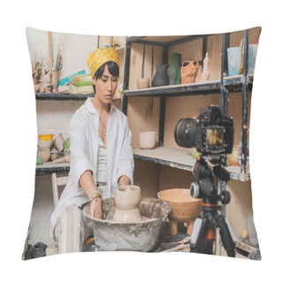 Personality  Young Asian Artist In Headscarf And Workwear Working With Wet Clay On Pottery Wheel Near Blurred Digital Camera On Tripod In Ceramic Workshop, Clay Sculpting Process Concept Pillow Covers