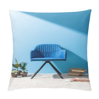 Personality  Comfy Blue Armchair With Person Holding Cup Of Coffee On Floor In Front Of Blue Wall Pillow Covers