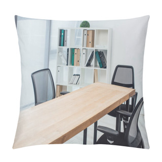 Personality  Wooden Table And Chairs Near Rack With Paper Folders In Office  Pillow Covers