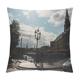 Personality  COPENHAGEN, DENMARK - APRIL 30, 2020: People On Urban Street With Christiansborg Palace And Cloudy Sky At Background  Pillow Covers