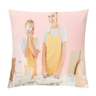 Personality  Smiling Young Mother And Daughter With Dough In Shape Of Heart Looking At Camera While Preparing Cookies Isolated On Pink Pillow Covers