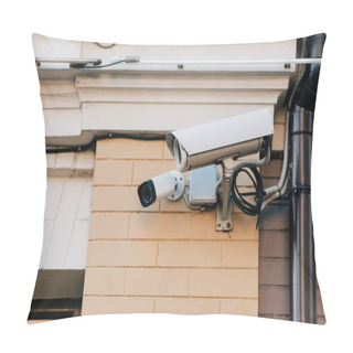 Personality  Close Up View Of Security Cameras On Orange Colored Building Facade Pillow Covers