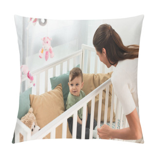 Personality  Smiling Kid Sitting In Baby Bed Near Mother  Pillow Covers