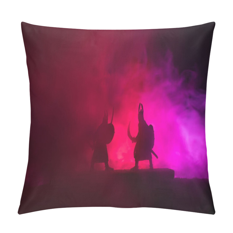 Personality  Silhouette of two medieval warriors in duel. Picture with two fighter with sword with dark toned foggy background. Selective focus. pillow covers