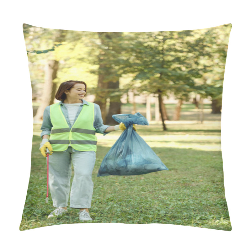 Personality  A Woman Wearing A Green Vest And Holding A Blue Bag, Standing Confidently In A Park, Possibly Ready To Clean Up Litter. Pillow Covers