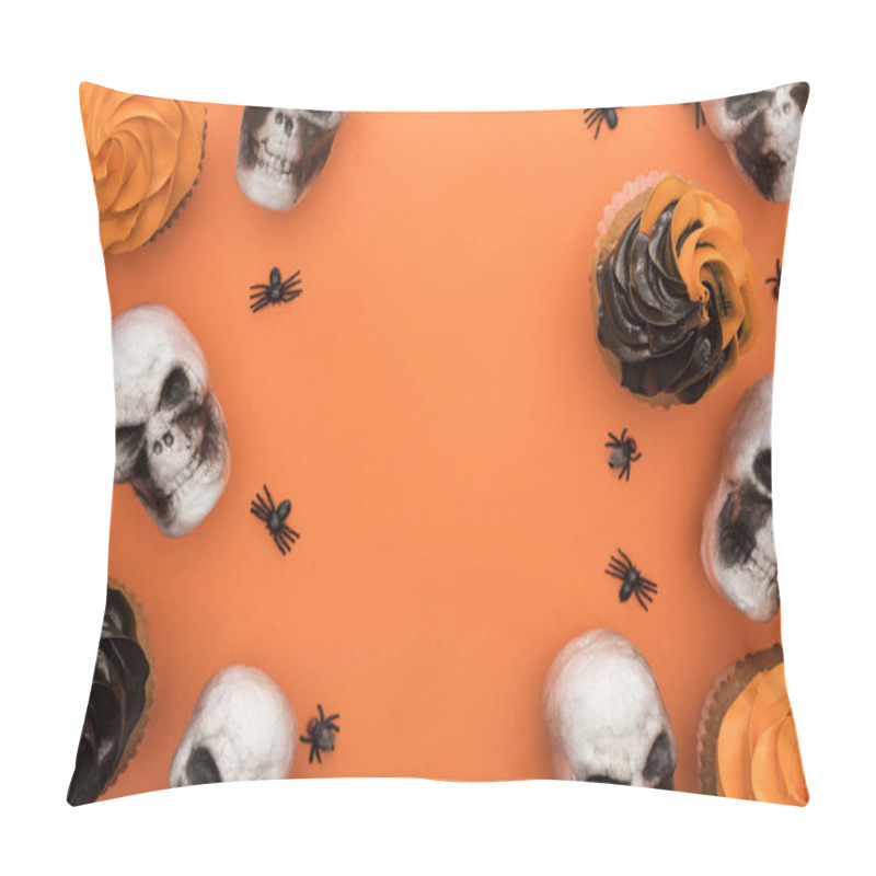 Personality  top view of tasty Halloween cupcakes with spiders and skulls on orange background with copy space pillow covers