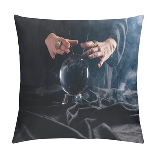 Personality  Cropped View Of Witch Performing Ritual With Crystal Ball On Black Background Pillow Covers