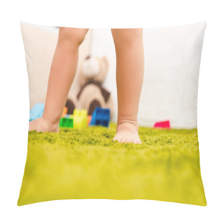 Personality  Cropped View Of Barefoot Child Standing On Green Floor Among Colorful Toys Pillow Covers