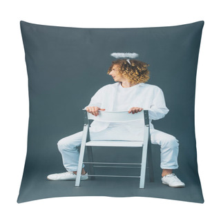 Personality  Smiling Curly Teenager In Angel Costume With Halo Above Head Sitting On Chair On Green Pillow Covers