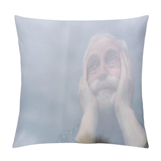 Personality  Selective Focus Of Senior, Lonely Man Touching Face And Looking Away Through Window Glass Pillow Covers