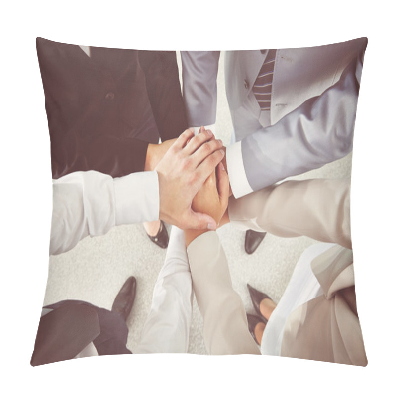 Personality  Hands of business partners making pile pillow covers