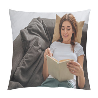 Personality  Cheerful Young Woman Reading Book While Chilling On Sofa In Living Room  Pillow Covers
