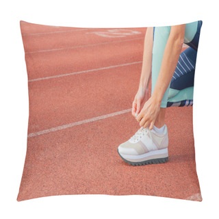 Personality  Sports Woman Runner Tying Shoelaces. Woman Lacing Her Sneakers On A Stadium Running Track. Workout Concept Pillow Covers