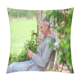 Personality  Mature Man Using Tablet On A Bench Pillow Covers