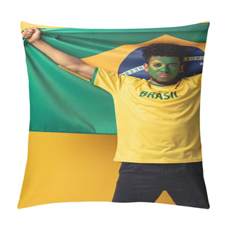 Personality  Serious African American Football Fan With Painted Face Holding Brazilian Flag On Yellow Pillow Covers
