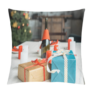 Personality  Selective Focus Of Christmas Gift Boxes At Served Table With Candles And Champagne Bottle  Pillow Covers