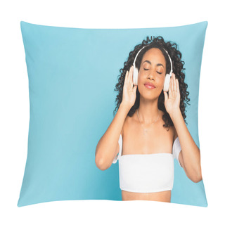 Personality  American Girl With Closed Eyes Listening Music And Touching Wireless Headphones Isolated On Blue  Pillow Covers