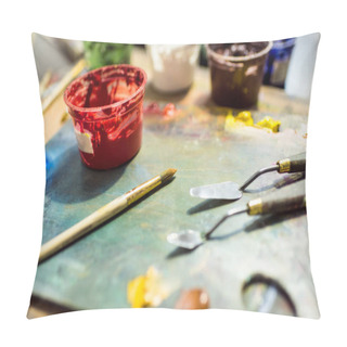 Personality  Painting Brushes, Palette And Poster Paints On Wooden Table In Workshop Pillow Covers