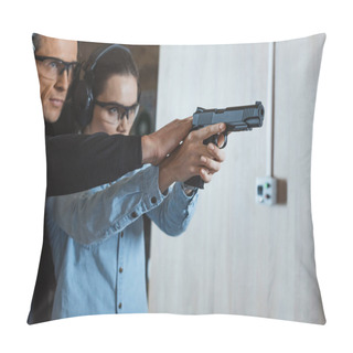 Personality  Male Instructor Helping Customer To Shoot With Gun In Shooting Range Pillow Covers