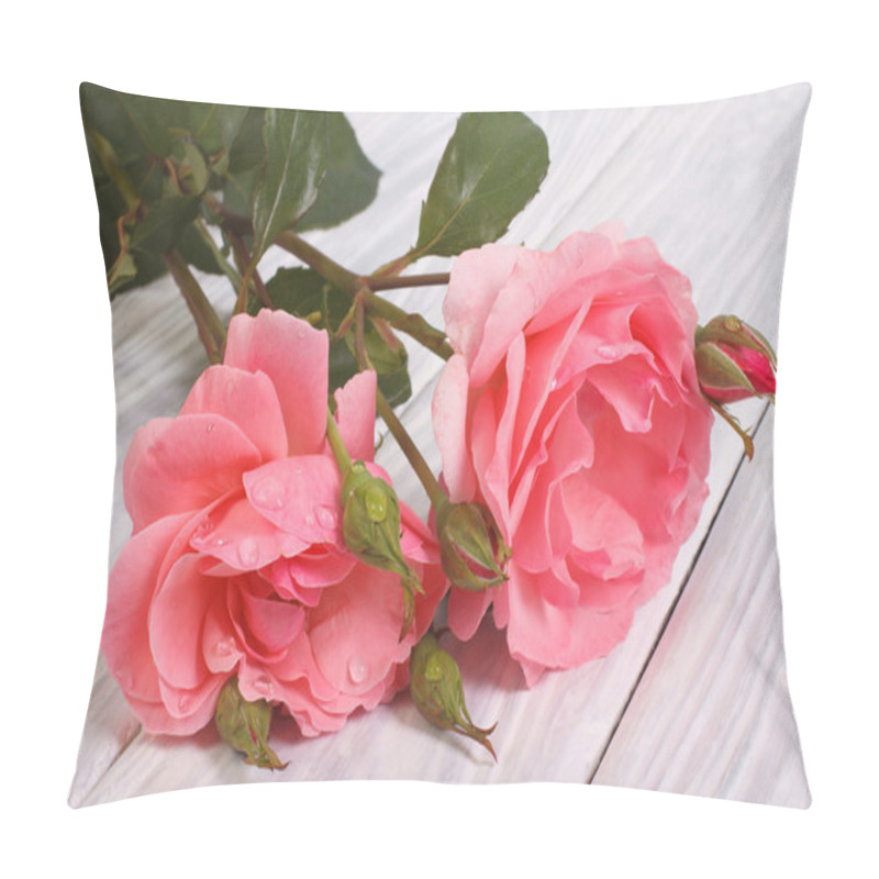 Personality  Beautiful flowers of pink roses on a light wooden table pillow covers