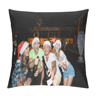 Personality  Selective Focus Of Excited Friends In Santa Hats Holding Bottles Of Champagne At Night Outdoors Pillow Covers