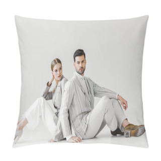 Personality  Couple Of Attractive Models In Vintage Clothes Sitting On Floor And Leaning Back To Back On White Pillow Covers