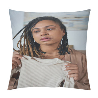 Personality  Depressed African American Woman Holding Baby Clothes And Crying In Bedroom, Miscarriage Concept Pillow Covers