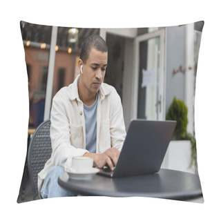 Personality  African American Freelancer In Wireless Earphones Sitting Near Cup Of Coffee And Using Laptop On Summer Terrace  Pillow Covers