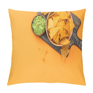 Personality  Top View Of Crispy Mexican Nachos Served With Guacamole On Wooden Cutting Board On Orange Background Pillow Covers