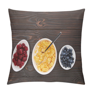 Personality  Top View Of Bowl With Cornflakes Near Plates With Raspberry And Blueberry On Wooden Surface Pillow Covers