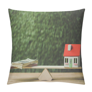 Personality  House Model And Dollar Banknotes Balancing On Seesaw On Green Background Pillow Covers