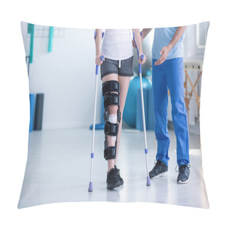 Personality  Sport Physiotherapist And Patient With Leg Injury During Training With Crutches Pillow Covers