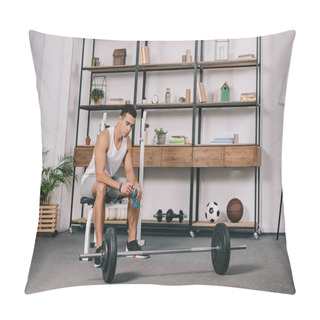 Personality  Pensive Bi-racial Man Sitting Near Barbell And Holding Sport Bottle  Pillow Covers
