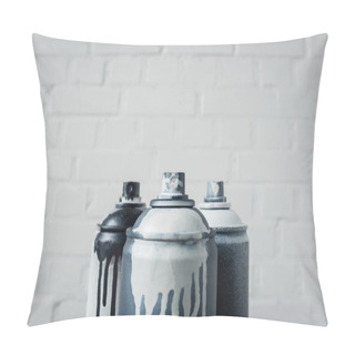 Personality  Close Up View Of Spray Paint In Cans With Brick Wall Background Pillow Covers