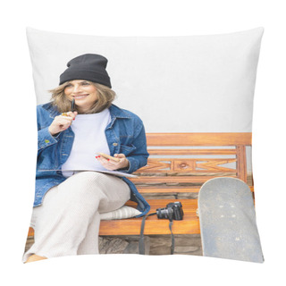 Personality  Smiling Artist Enjoys A Creative Break Outdoors, With A Pen In Hand And A Smartphone For Ideas, Alongside Her Skateboard And Camera. Pillow Covers