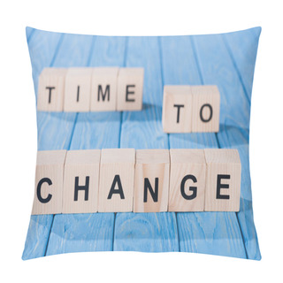 Personality  Close Up View Of Arranged Wooden Blocks Into Time To Change Phrase On Blue Wooden Surface  Pillow Covers