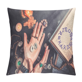 Personality  Astrology And Esotericism. The Witch Is Holding In His Hands The Rune Stones.On A Black Background Lie Fortune-telling Runes, A Book, Precious Amulets, A Copper Lamp And A Candle.Zodiac Horoscope In The Book. Pillow Covers