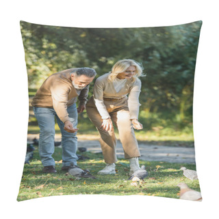 Personality  Full Length Of Happy Middle Aged Couple Luring Wild Pigeons In Park  Pillow Covers