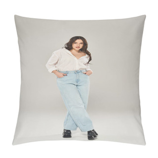 Personality  A Beautiful Plus Size Woman Strikes A Pose In A White Shirt And Blue Jeans Against A Gray Backdrop. Pillow Covers
