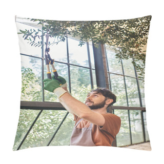 Personality  Handsome Gardener In Linen Apron Cutting Branch On Tree With Big Gardening Scissors In Greenhouse Pillow Covers