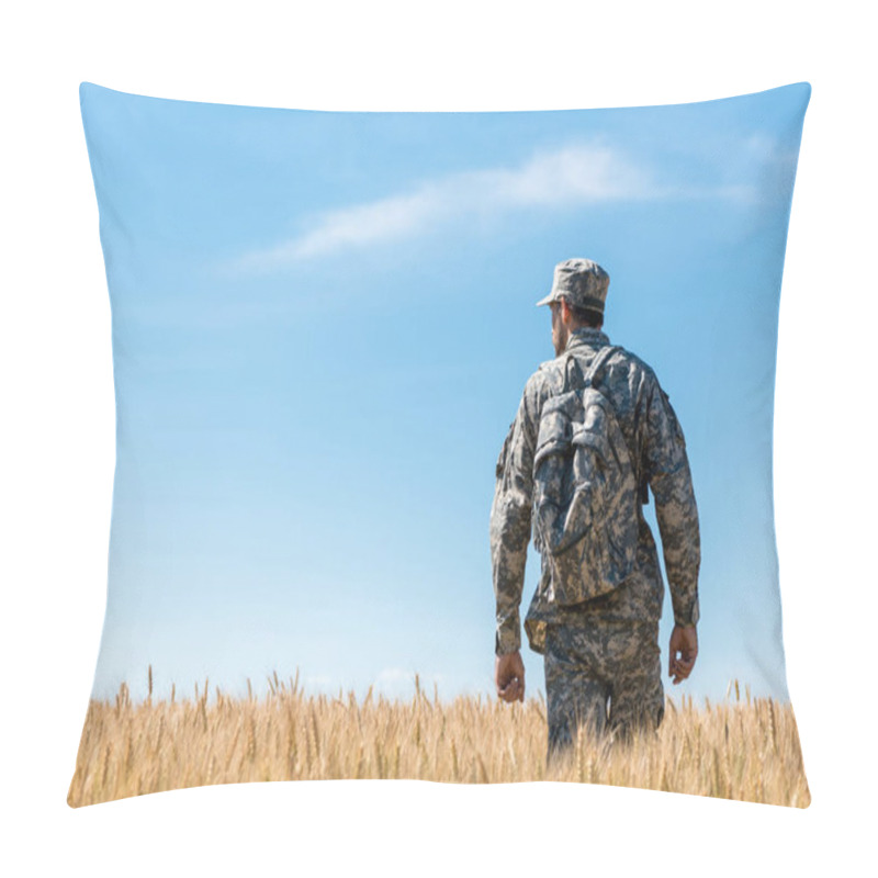 Personality  soldier in military uniform with backpack standing in field with golden wheat  pillow covers