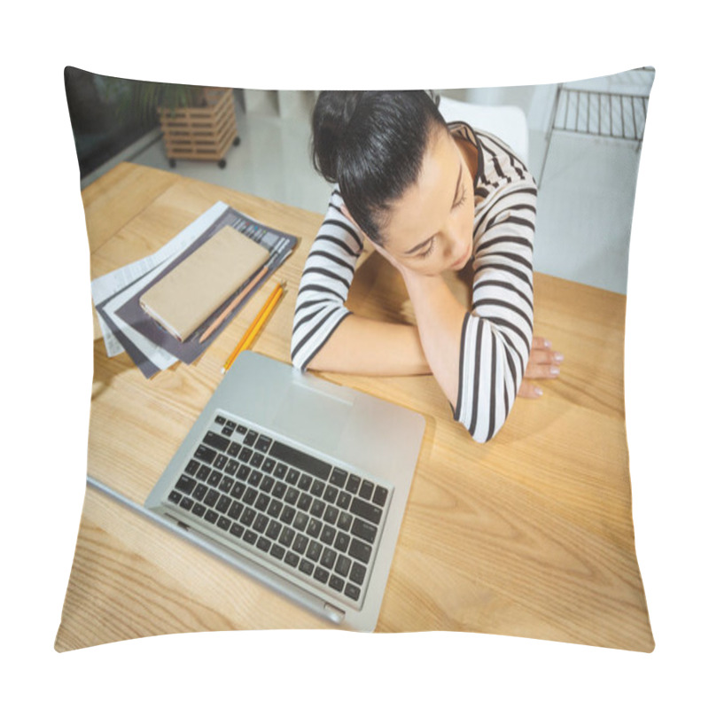 Personality  Top view of a hard working tired woman being asleep pillow covers