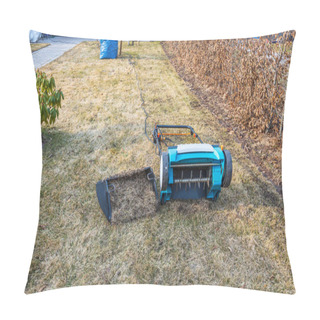 Personality  Preparing The Lawn For Summer With An Electric Aerator In Early Spring. Garden Machines Concept.   Pillow Covers