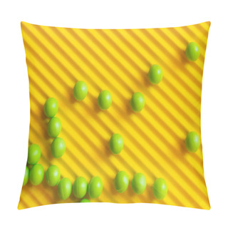Personality  Top View Of Small Green Balls Scattered On Textured Yellow Background Pillow Covers